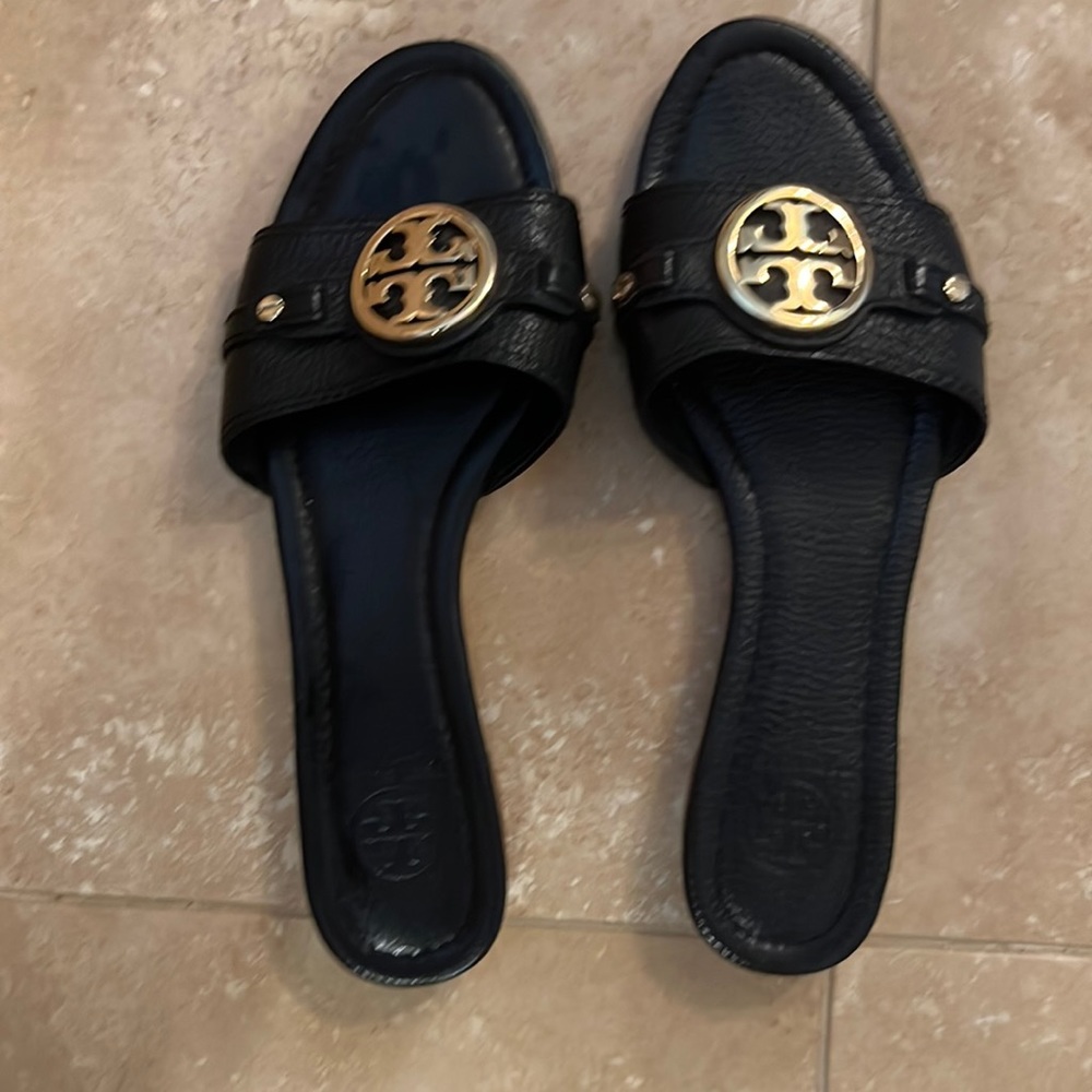 Tory Burch black slides. They are very cute and in great condition.